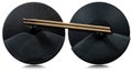 Two Black Cymbals of an Electronic Drum Kit and a Pair of Wooden Drumsticks