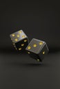 Two black dice with gold dots floating on a black background. 3d illustration Royalty Free Stock Photo