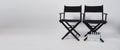 Two black director chair and clapper board use in video production or movie and cinema industry on white background