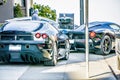 Two black ferrarri super cars on streets of san francisco