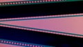 Two black film strips on pink background close up. 35mm film slide frame. Copy space.