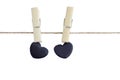 Two black hearts on a rope with clothespins. Love card. clipping path