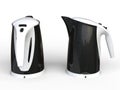 Two Black Kettles with white hand grips Royalty Free Stock Photo