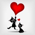 Two black kittens and red heart-balloon