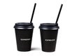 Two black paper coffee cup with straws isolated on white background Royalty Free Stock Photo