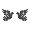 Two black pigeons icon or logo Royalty Free Stock Photo