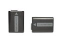 Two black plastic lithium ion batteries Royalty Free Stock Photo