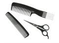 Two black professional combs and scissors. Royalty Free Stock Photo