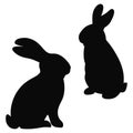 Two black rabbit silhouettes facing each other bunny Royalty Free Stock Photo