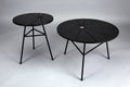 two black round modern tables