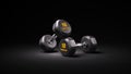 Two black rubber dumbbells on dark background 3d