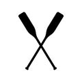 Two black silhouette of crossed oars