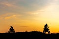 Two Black silhouette Motocross rider on a motorcycle in front of colorful sunset Royalty Free Stock Photo