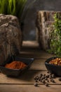 Two black small bowls with dry chillies and sweet paprika Royalty Free Stock Photo