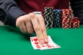 Two blackjack playing cards on the green baize table in the casino Royalty Free Stock Photo