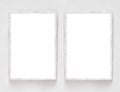 Two blank banners with wooden frame on plaster wall background