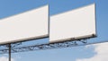 Two Blank Billboards Against Blue Sky Royalty Free Stock Photo