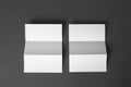 Two blank brochures on dark grey background. Mock up for design Royalty Free Stock Photo