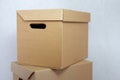 Two blank cardboard boxes on top of each other on a gray background Royalty Free Stock Photo