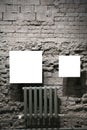 Two blank frames on grey brick wall Royalty Free Stock Photo