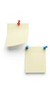 Two blank notes attached to a surface isolated on white background Royalty Free Stock Photo