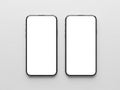 Two blank smartphones side by side Royalty Free Stock Photo