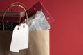 Two blank tags and a bag full of gifts Royalty Free Stock Photo