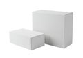 Two plain white cardboard boxes of different sizes isolated on a white background Royalty Free Stock Photo