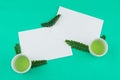 Two blank white cards and green tea in cups Royalty Free Stock Photo