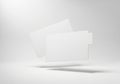 Two blank white cards floating in the air with soft shadows isolated on white background Royalty Free Stock Photo