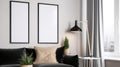 Two blank white photo frame mockup with a lamp and small plant on the wall, A minimal simple tone of sofa and a window Royalty Free Stock Photo