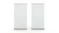 Two Blank White Roll Up Banner Stands on White Background display Royalty Free Stock Photo