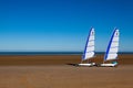 Two Blokart wind buggy enjoying a windy day on the Cabourg beach