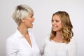 Two blond women smiling Royalty Free Stock Photo