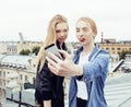 Two blonde real teenage girl hanging out at summer together best friends, lifestyle people concept Royalty Free Stock Photo