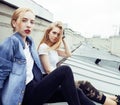 Two blonde real teenage girl hanging out at summer together best friends, lifestyle people concept Royalty Free Stock Photo