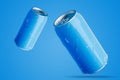Two blue aluminum cans with water drops