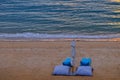 Two blue beach couch setting on the beach Royalty Free Stock Photo