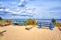 Two blue benches on the cliff in ÃÅckeritz on the beach. Baltic Sea in Mecklenburg-Vorpommern, Germany