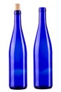 Two blue bottles, one with a cork, the other without isolated on white background. Vertically standing wine bottle. File contains Royalty Free Stock Photo