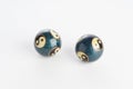 Two blue chinese yin yang balls on white background Royalty Free Stock Photo