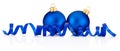 Two Blue Christmas baubles and curling paper Isolated on white Royalty Free Stock Photo