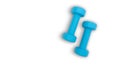 two blue dumbells 2 kg. Fitness equipment for home exercise and flexibility training.