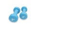 Two blue dumbells 2 kg. Fitness equipment for home exercise and flexibility training.