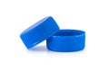 Two blue plastic bottle caps Royalty Free Stock Photo