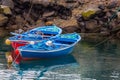 Two blue small fishing boats in greek style Royalty Free Stock Photo