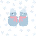 Two blue snowmen with pink scarves Royalty Free Stock Photo