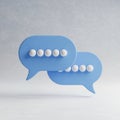 Two Blue Speech Bubbles with White Dots Representing Conversation or Messaging chat communication Royalty Free Stock Photo