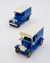 Two blue vintage delivery vans. Royalty Free Stock Photo