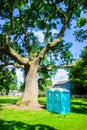 Two blue - white portable toilet cabins at outside event UK Royalty Free Stock Photo